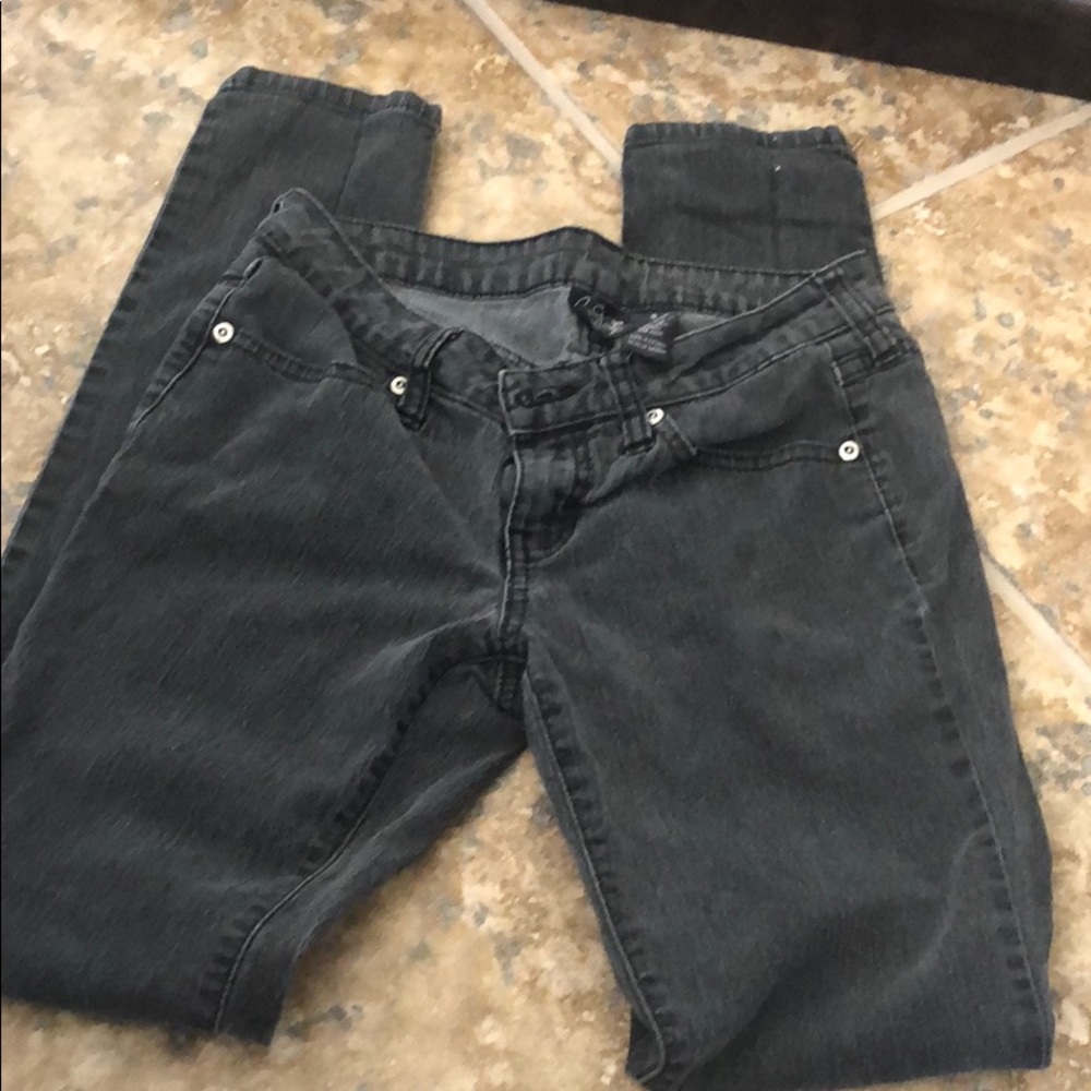Faded black skinny jeans